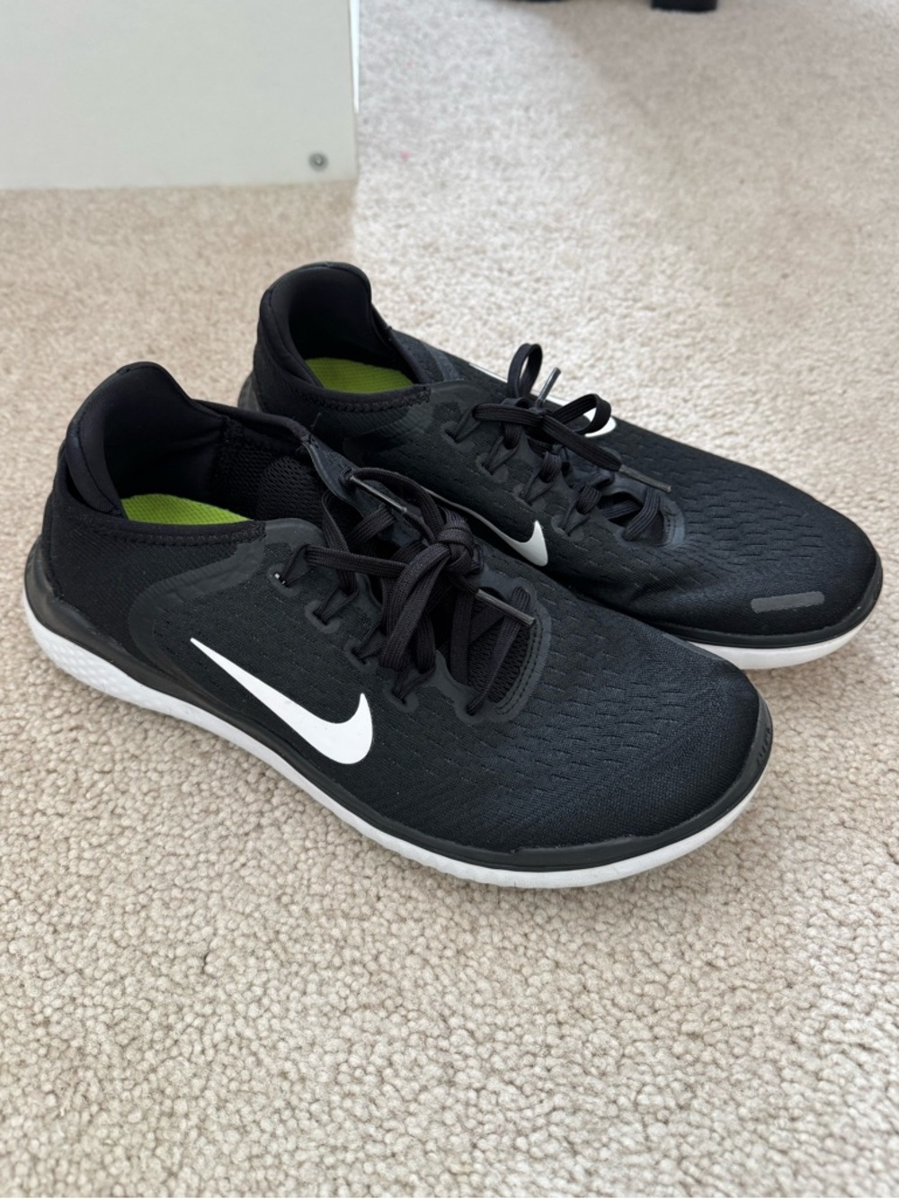 Nike women Black Running Shoes with White Swoosh